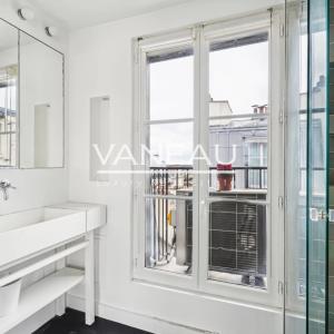 DERNIER ETAGE - Appartement en duplex avec vue Sacré-Coeur