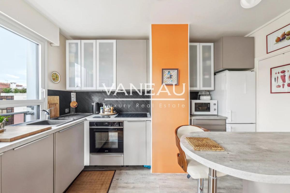 Vue tour Eiffel - appartement Saint Charles - Pont Mirabeau - Be